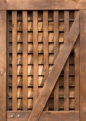 Naklejka na ściany i meble Close up of old wooden barn door