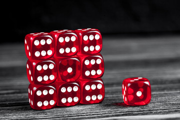 concept luck - dice gambling on dark wooden background