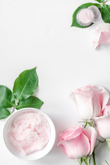 organic cosmetic with rose oil on white background top view