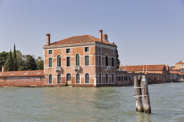 Fototapeta na wymiar Lagoon and cityscape in Venice, Italy.