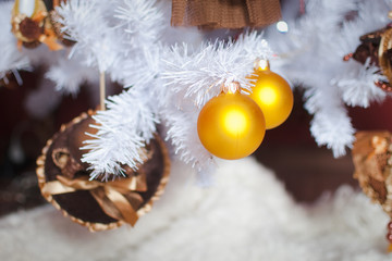 Christmas light interior with hat and gold toys