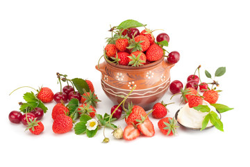 Strawberries with cream and ripe cherry.