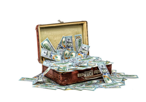 Open old vintage suitcase full of money, business concept
