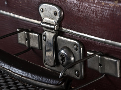 close-up fragment of locks and fasteners on the vintage leather