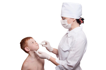 Female doctor buries nose on a white background. Isolated on whi