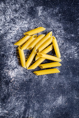 various kinds of paste on dark background top view