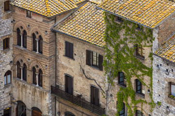 Fototapeta na wymiar old walls of tuscany houses in Siena