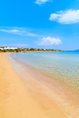 View of beautiful sandy Santa Maria beach with azure sea water on coast of Paros island, Greece