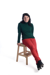 Portrait of a woman sitting with white background