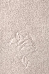 Textured  paper with embossed rose