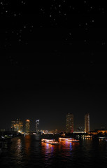 Bangkok night riverside with starry sky