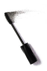 Black mascara brush strokes on background