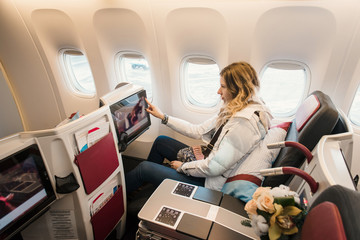 Fototapeta premium Passenger in business class of airplane