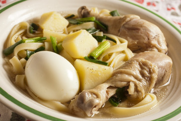 caldo de gallina, the classic Peruvian chicken noodle soup