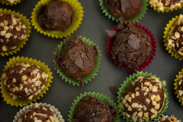 Homemade chocolate truffles in a small paper bag