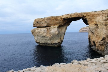 Fototapeta na wymiar Azure Blue Window in Gozo Malta showing Rock Formation
