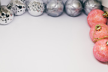 pink and silver Christmas decorations isolated on white background