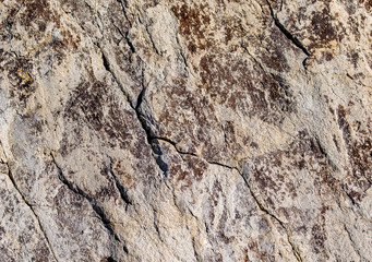 Granite stone wall abstract background.
