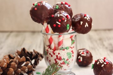 Christmas cake balls covered in chocolate Ganache, selective focus