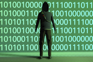 A hacker and binary code
