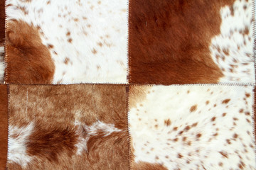 Close-up of an Argentinean handicraft sewn with cow and deer hid