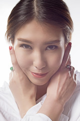 portrait of  beautiful woman with jade ring