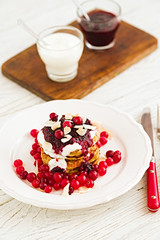 Morning breakfast, pancakes with banana, coconut flour and blueb