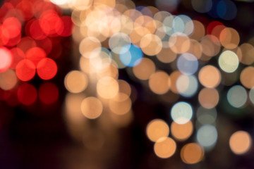 Blurred traffic jam with bokeh of car's light in Thailand