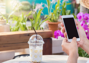 Woman hands holding a smartphone.