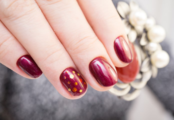 Perfect manicure and natural nails. Attractive modern nail art design. Gel polish applied.