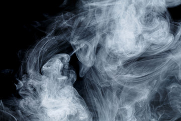 Abstract smoke Weipa. Personal vaporizers fragrant steam. The concept of alternative non-nicotine smoking. Blue smoke on a black background. E-cigarette. Evaporator. Taking Close-up. Vaping.
