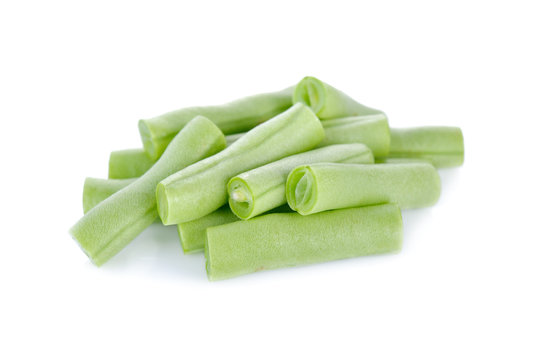 heap of French beans on white background