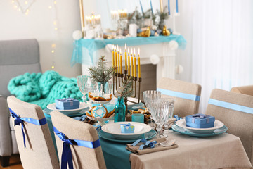 Table served for Hanukkah in living room