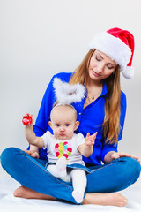 Christmas woman with cute baby.