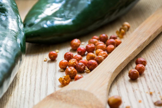 Dried chiltepin chili and fresh poblano pepper, Mexican ingredients