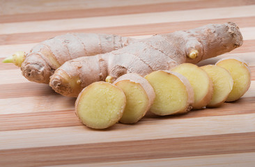 Ginger on wooden bamboo cutting board