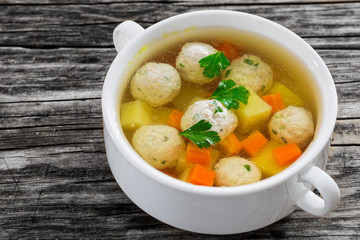 organic chicken soup with meatballs, carrot and potato
