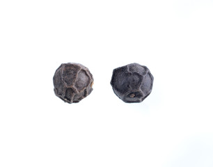 Black pepper was placed on a white background