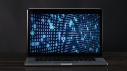 binary data in blue color at laptop