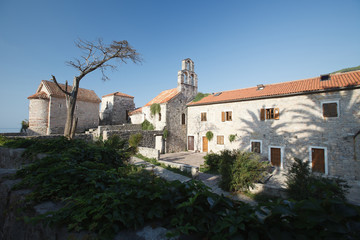 Fototapeta na wymiar View of the ancient Catholic Church of Santa Maria in Punta. Budva. Montenegro