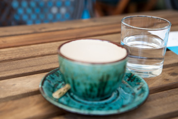 Cup of coffee and glass of water
