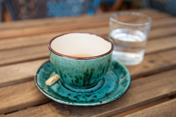 Cup of coffee and glass of water