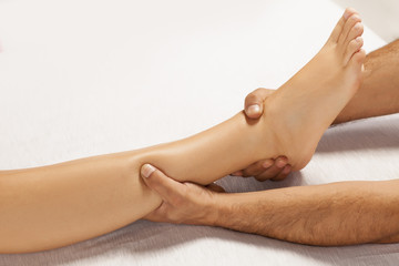 leg massage, stretching the ancle