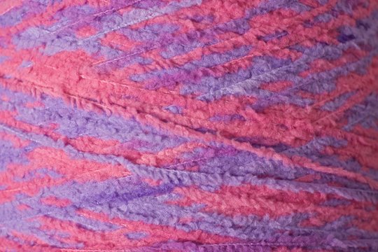 Mixed Pink Crochet Spongy Yarn Threads close-up shot background texture