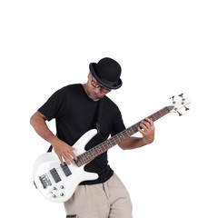 Studio portrait of senior man with hat playing guitar.