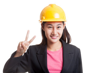 Asian engineer woman show Victory sign.