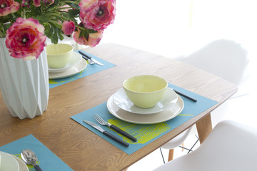 table setting on dining table,green tone