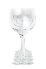 Wine glasses arranged on a table, isolated over white