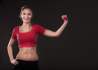 portrait of smiling athlete weightlifting