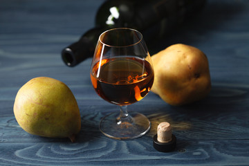 composition with traditional fruit brandy and pears